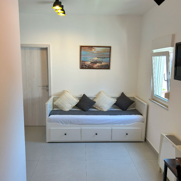 Living room, Villa Perla, Villa Perla in Bratu&scaron; on the Makarska Riviera &ndash; Apartments with a view of the Adriatic Sea Ba&scaron;ka Voda